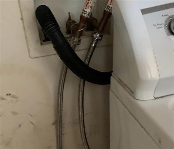 failed water hose on washing machine