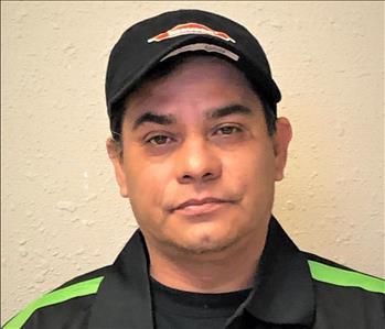 a brown haired male headshot wearing the black SERVPRO Ready uniform 