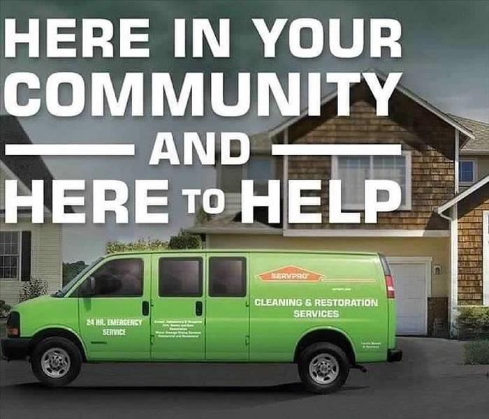 a green servpro truck with title Here in your community, Here to Help