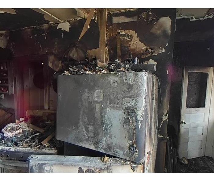 extensive fire and soot damage to a kitchen 